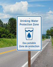 A photograph of a drinking water protection road sign